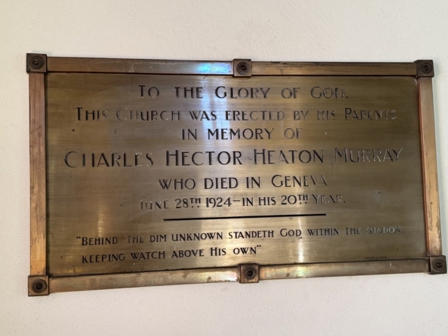 Brass memorial plaque at Saint Oswald's heritage church wedding venue, engraved with dedication to Charles Hector Heaton Murray, showcasing classical chapel architecture and timeless elegance.